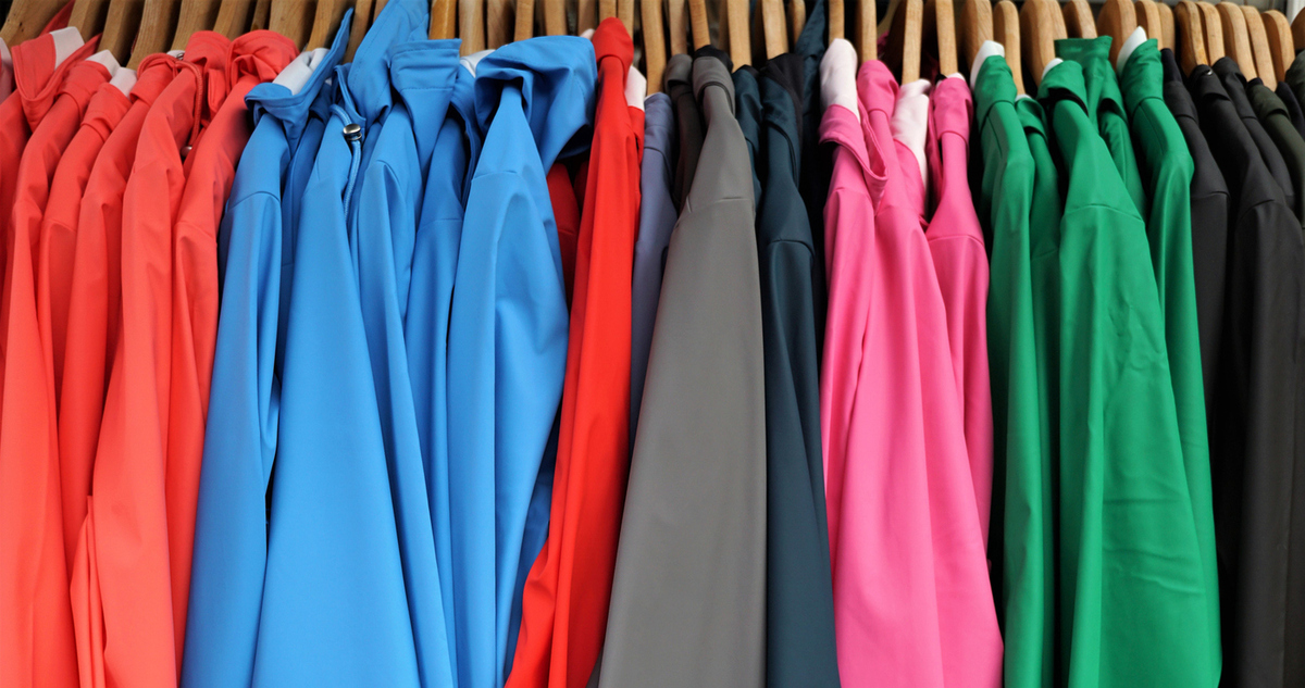 Multi Colored Raincoats Hanging On Rack In Store - Gyerekszoba Fotó: Getty